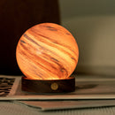 Mini Illuminated glass globe in orange