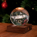 Illuminated Gingko Crystal Ball with solar system inside